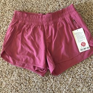 lululemon athletica Shorts - NWT Lululemon tracker short 4” in lush. Size 12 lululemon athletica Shorts - NWT Lululemon tracker short 4” in lush. Size 12
